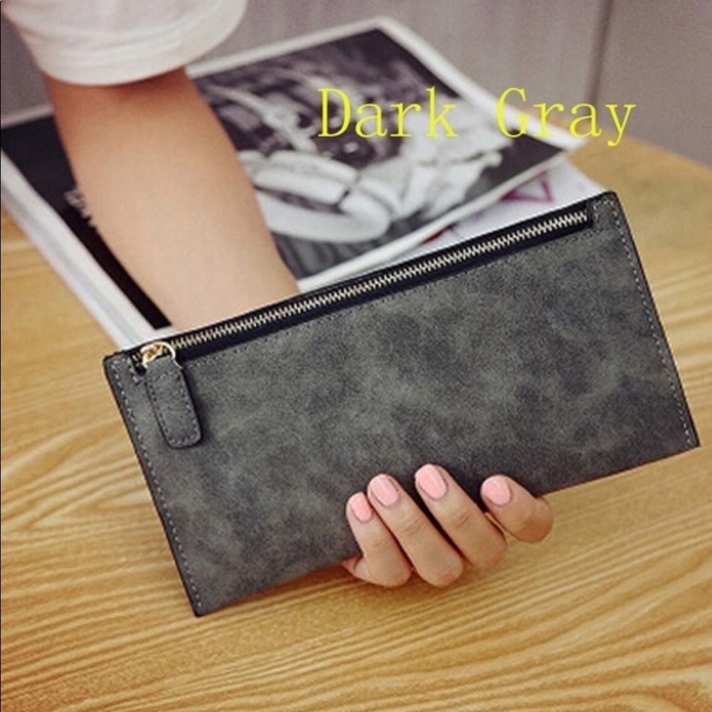 Woman’s faux leather zip wallet.